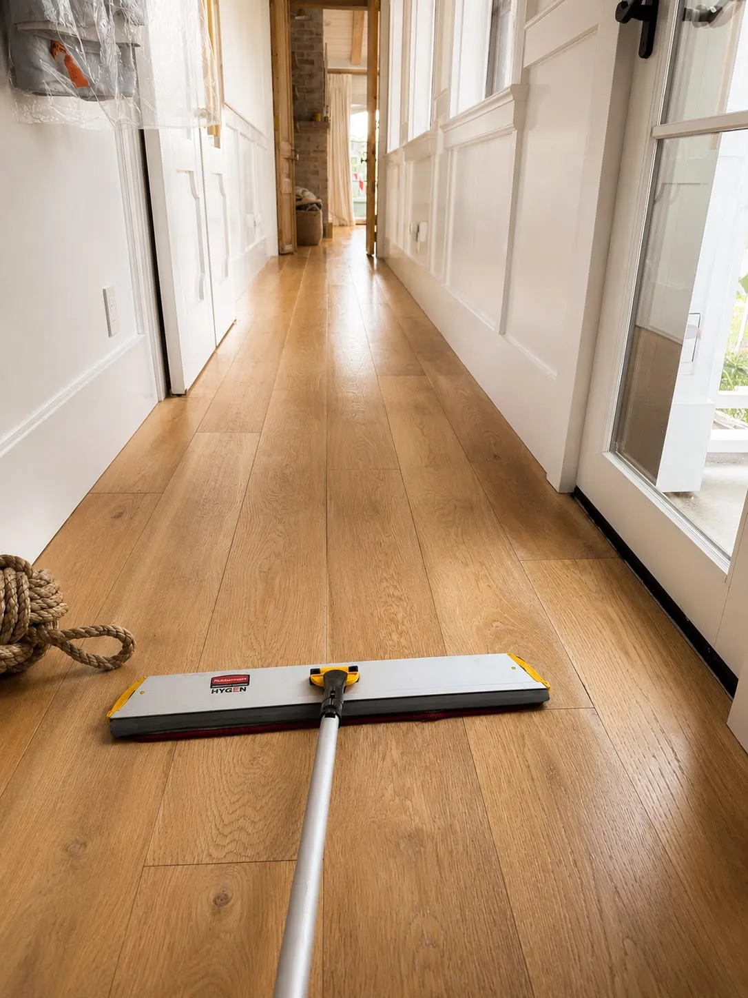 Professional microfiber mopping of hardwood floors by Gabby's Cleaning Service in Orange County